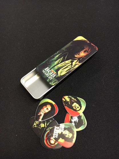 Dunlop Bob Marley Rasta Series Medium plektrat tinalaatikossa - Aron Soitin